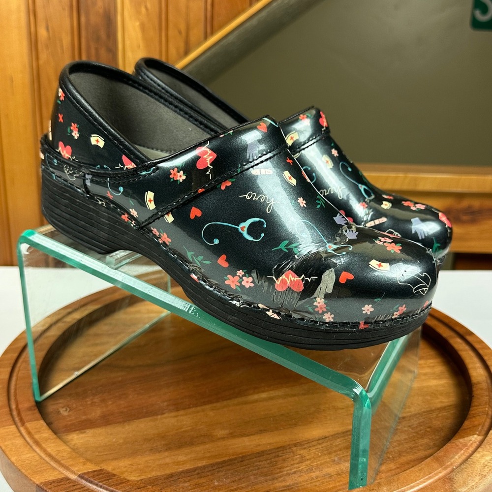 Dansko LT Professional Black Patent Medical Hero Print Clogs Womens 38